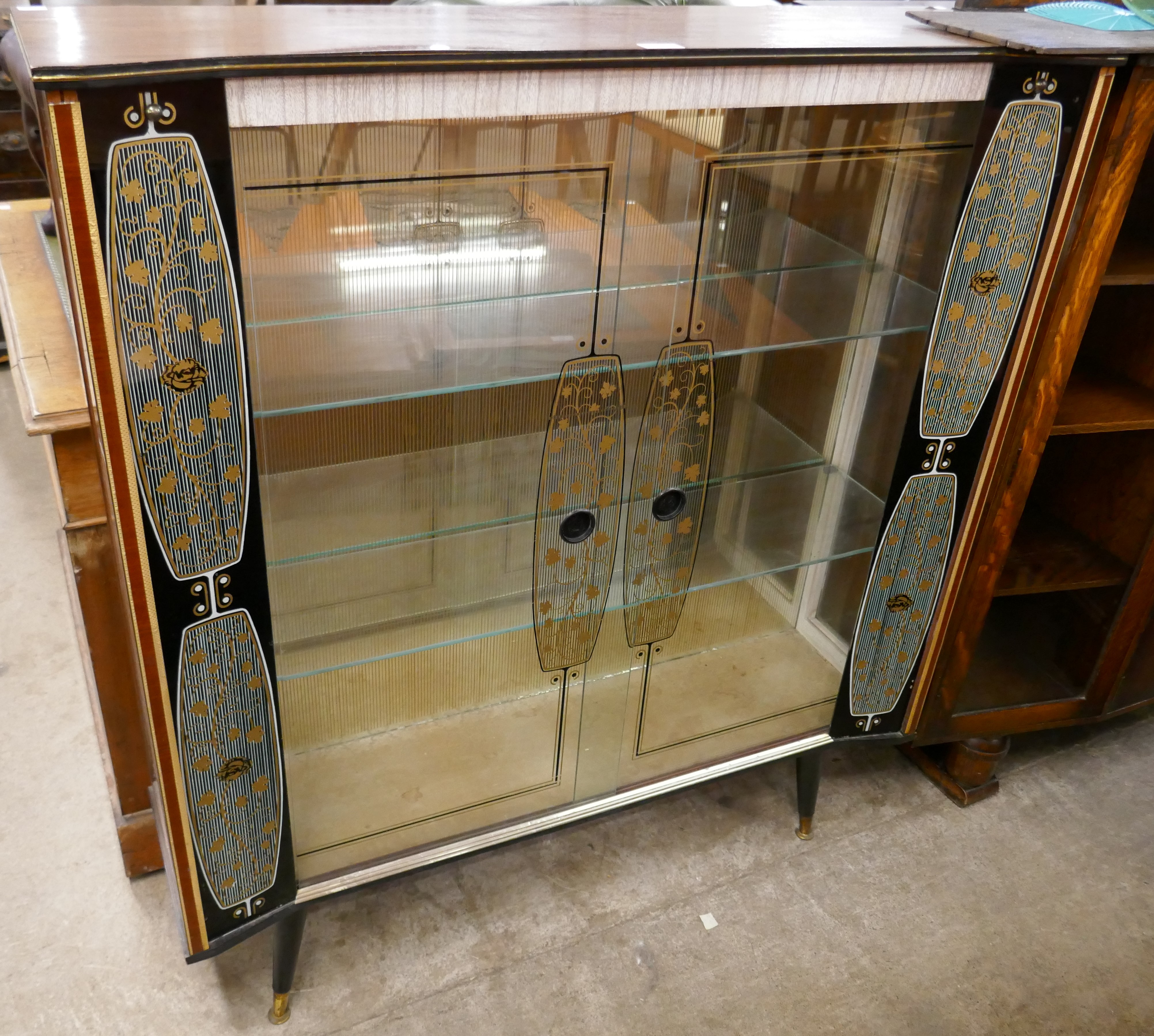 A walnut cocktail cabinet