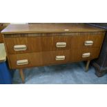 A small teak sideboard