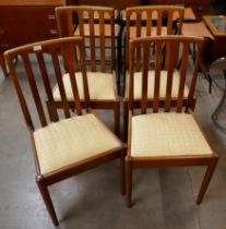 A set of four Meredew teak dining chairs