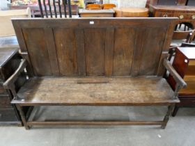 An 18th Century and later oak bench