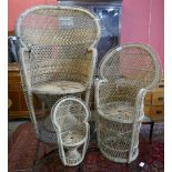 A set of three Italian graduated wicker peacock chairs