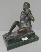 An Art Deco style bronze figure of a lady, on green marble socle