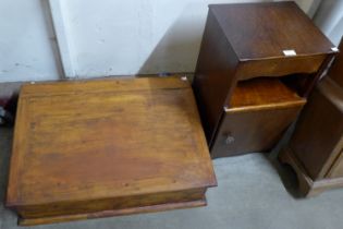 A Victorian pine table top clerk's desk and an oak bedside table