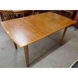 A teak dining table