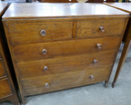 An Arts and Crafts Heals style oak chest of drawers