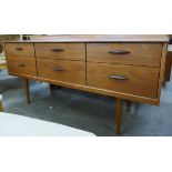 A teak six drawer sideboard