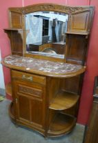 A 19th Century French oak and marble topped mirrorback side cabinet