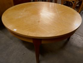 A Stonehill teak circular sunburst coffee table