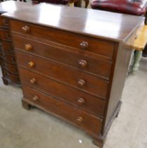 A George III oak chest of drawers