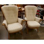 A pair of Ercol Blonde beech Evergreen armchairs. Purchased by the vendor from Hopewells, Nottingham