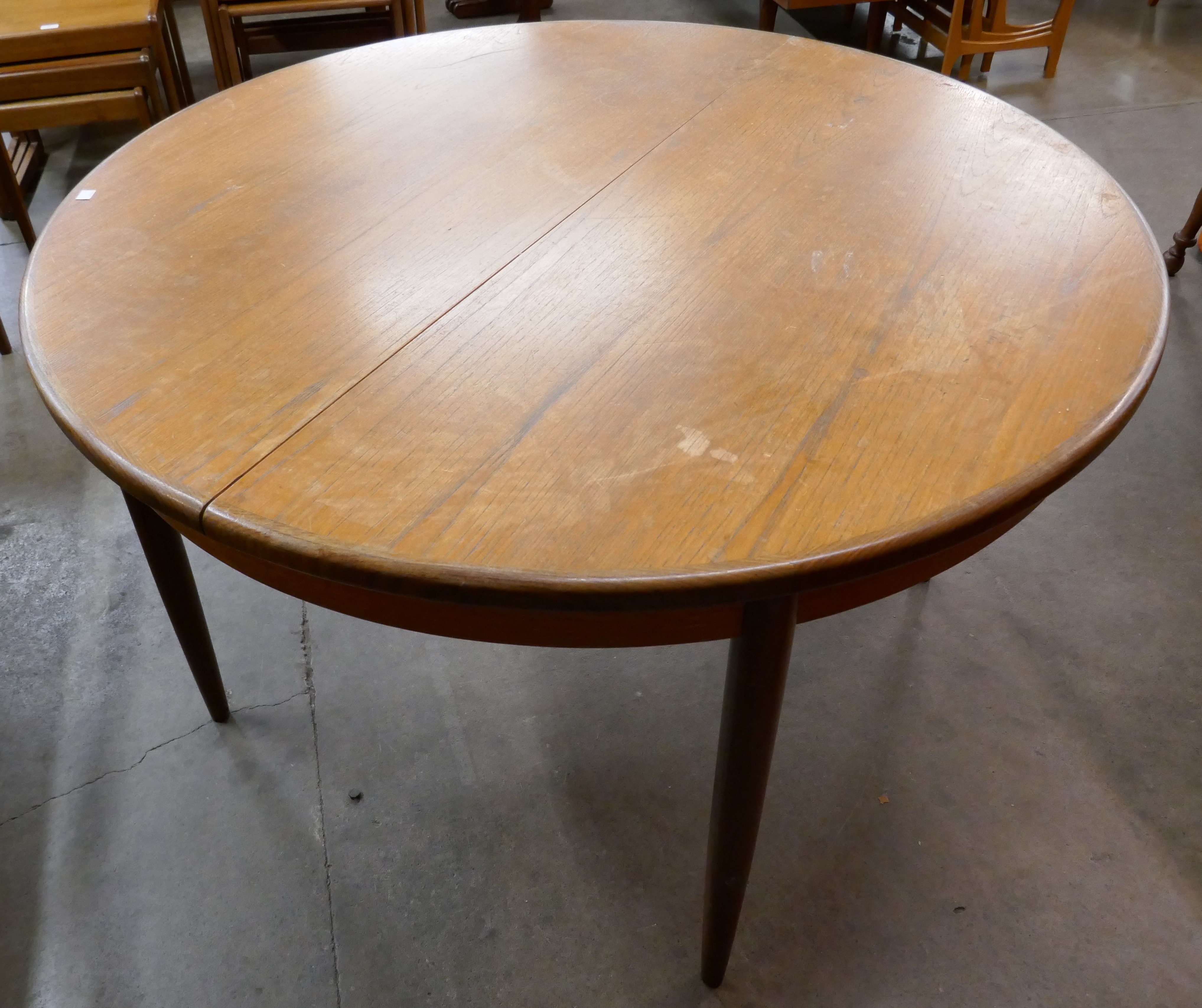 A G-Plan Fresco teak circular extending dining table