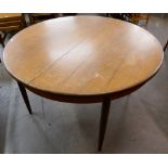 A G-Plan Fresco teak circular extending dining table