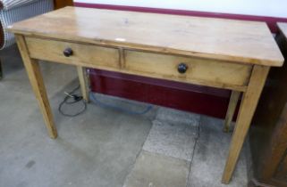A Victorian pine two drawer kitchen serving table