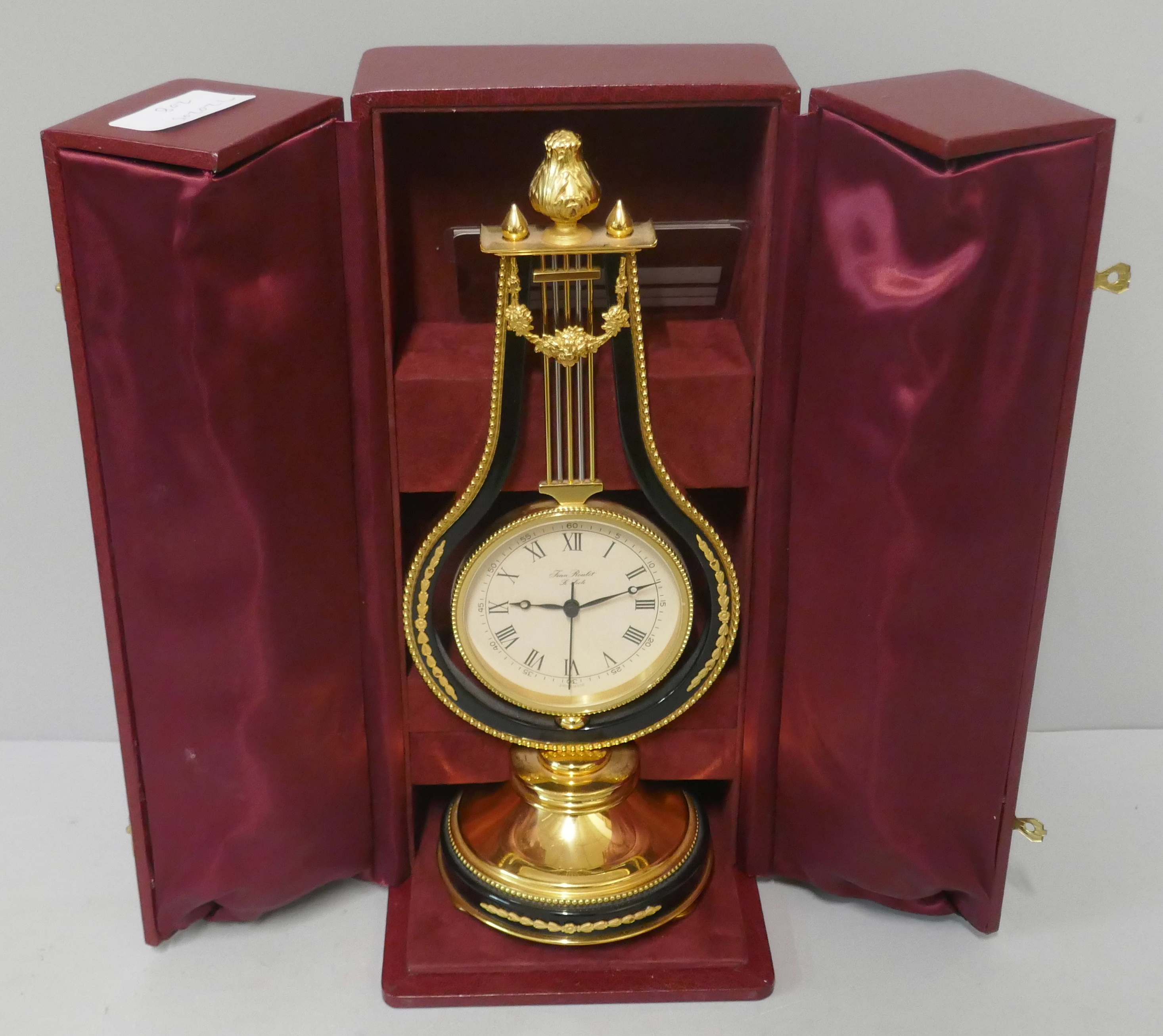 A jean Roulet Le Locle brass mantel timepiece, cased