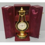 A jean Roulet Le Locle brass mantel timepiece, cased