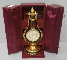 A jean Roulet Le Locle brass mantel timepiece, cased