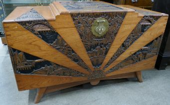 A Chinese carved camphorwood blanket box