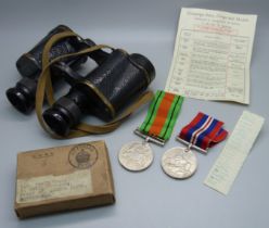 A pair of military issue binoculars, Taylor-Hobson, 1943, and a pair of WWII medals in original