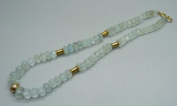 A crystal necklace with an 18ct gold hook fastener, 44cm