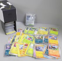 500+ Pokemon cards including 50 holo and reverse holo cards in collectors box