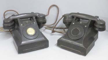 Two Bakelite extension telephones