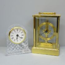 An Emes brass and glass clock, battery movement and one other lead crystal dome top clock