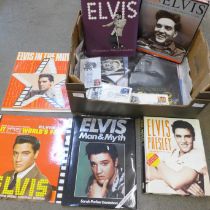 A collection of Elvis Presley books, (7), three LP records, first day covers, Marilyn Monroe