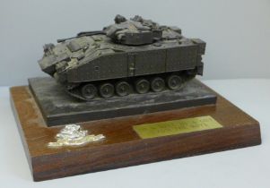 A cold cast bronze model tank, mounted with The West Riding badge