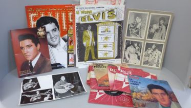 Elvis Presley; twelve 7" singles and EPs and other Elvis memorabilia, $10 notes, photographs, etc.