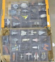 A collection of forty Star Wars vehicles in perspex display cases