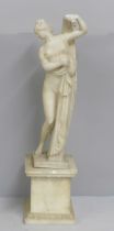 An alabaster figure of the Goddess Venus Aphrodite, plinth restored, 50cm