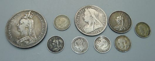 A Victorian crown, 1890, a 1900 half crown, a shilling and six 3d coins, 55g