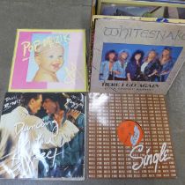 A case of 12" singles, 40-50 approximately including rock and pop, Rolling Stones, David Bowie, etc.