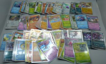 Over 100 Holo and reverse Holo Pokemon cards