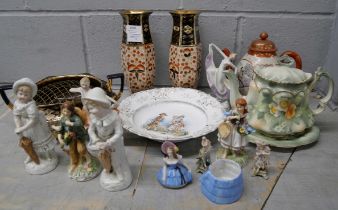 Two teapots, a pair of vases with matching rose bowl, a/f, a bowl, three pairs of figures and