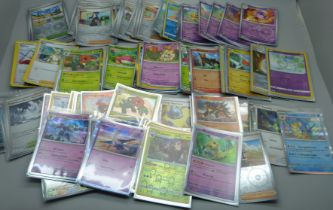 Over 100 Holo and reverse Holo Pokemon cards