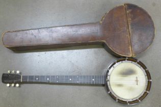 A late 19th Century banjo, marked 'Unwarpable, patent no. 23974 Rd. 294951', with inlaid case and