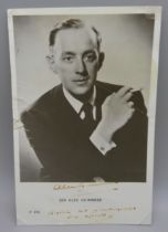 A Sir Alec Guinness autographed postcard, (Star Wars, Fagin, etc.)