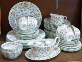 An eight setting Minton Haddon Hall tea and dinner service **PLEASE NOTE THIS LOT IS NOT ELIGIBLE