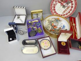 A box of mixed costume jewellery, lady's wristwatch, travel clock, etc.