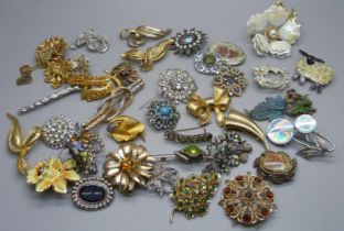 Forty brooches