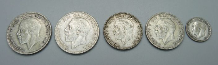 A 1925 sixpence, two half crowns, 1929 and 1934 and two florins, 1931 and 1936