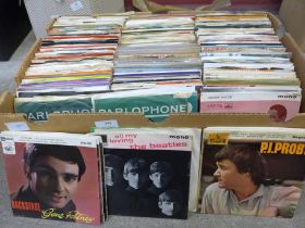 A box of rock and pop 7" singles, The Beatles, Cream, Queen, Elvis, etc., (approximately 300)