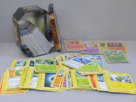 30 Holo/reverse, 300 common, uncommon and rare Pokemon cards