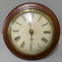 A Victorian circular mahogany postman's wall clock with striking movement