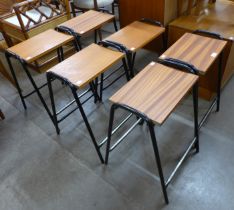 A set of six teak and black tubular steel stools
