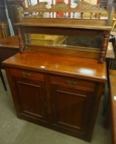 A Victorian walnut mirrorback side cabinet