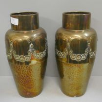 A pair of brass WMF vases