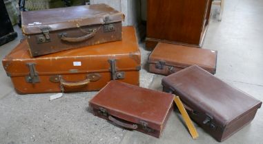 Five vintage leather cases