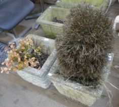 Two square concrete garden planters